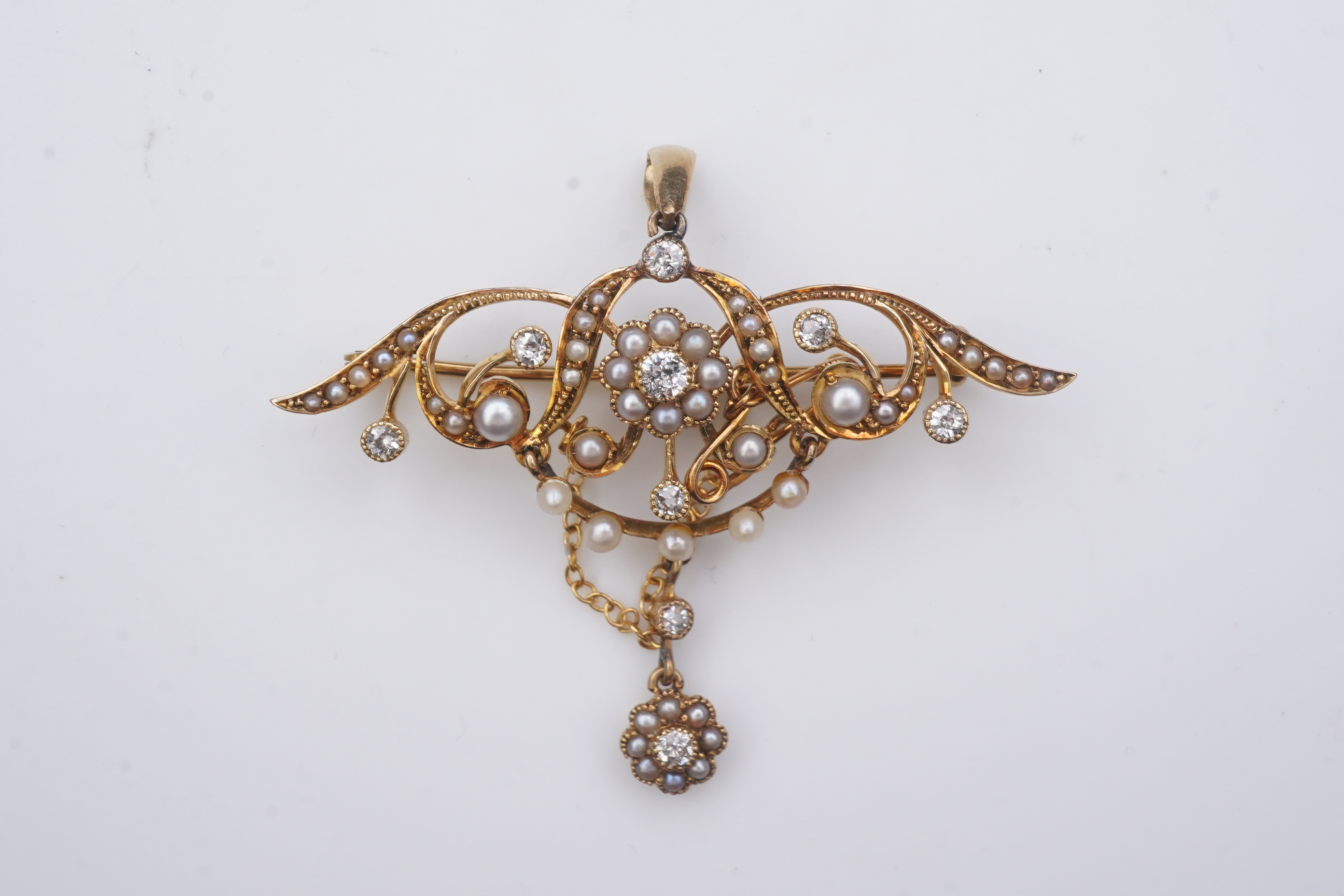 An Edwardian seed pearl and diamond brooch, early 20th century